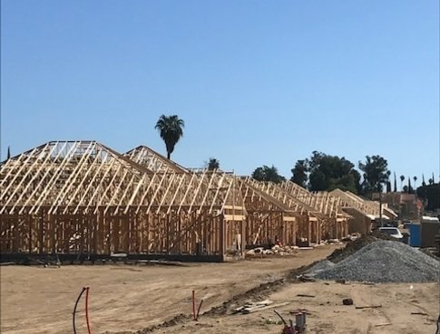 wood framing of the neighborhood being built