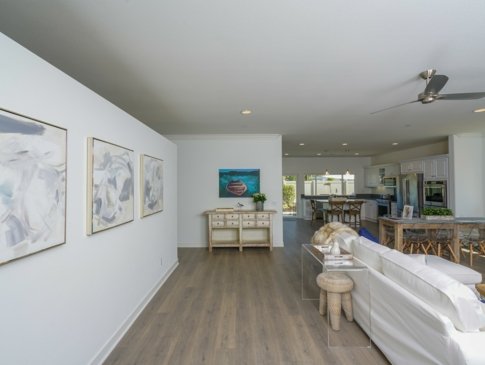 view from the front entrance of the home with living room and kitchen