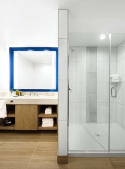Glass shower in a hotel room