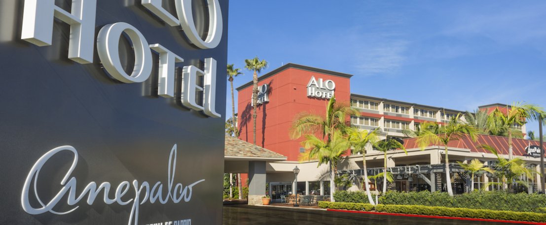 ALO Hotel sign with the hotel in the background